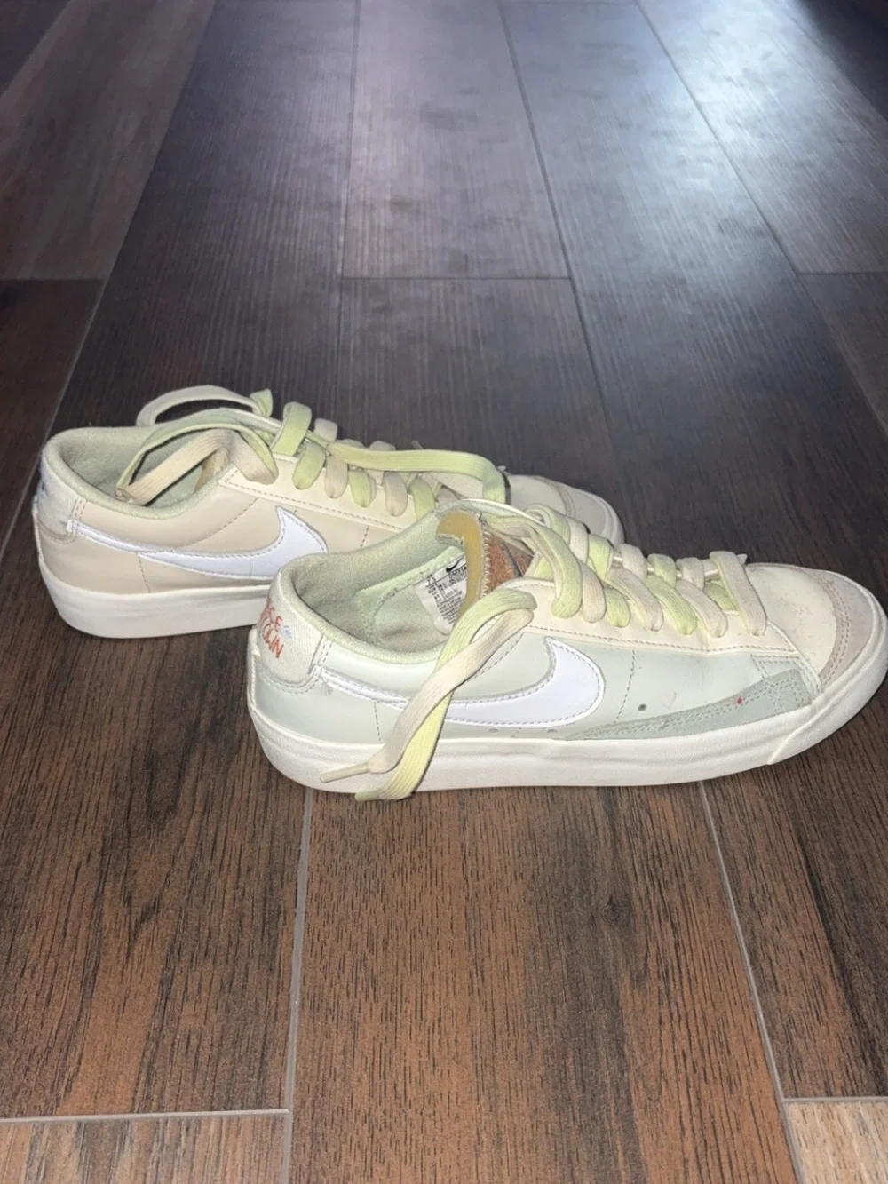 Nike Women's Low-Top Sneakers in Ivory with Pale Green Accents